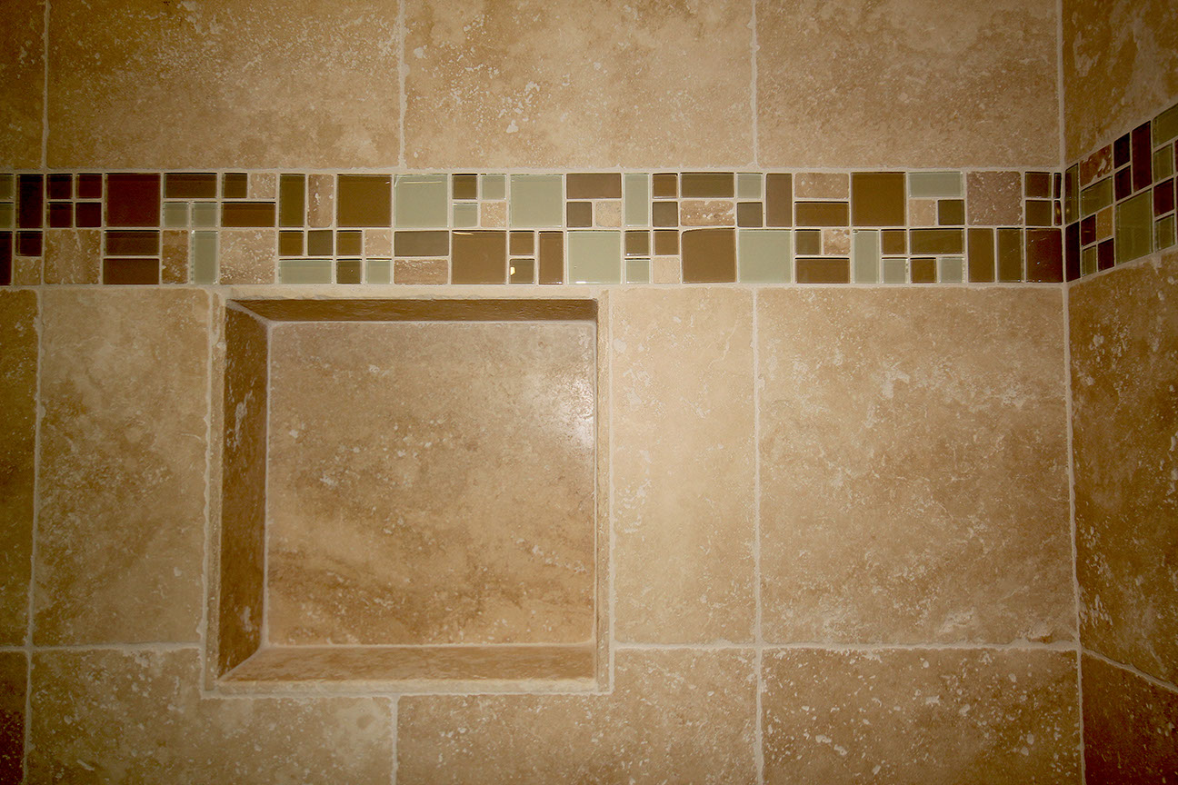 Detail of stone tile shower stall.