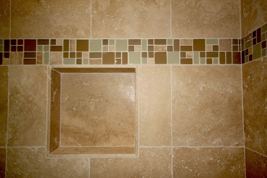 Detail of stone tile shower stall.