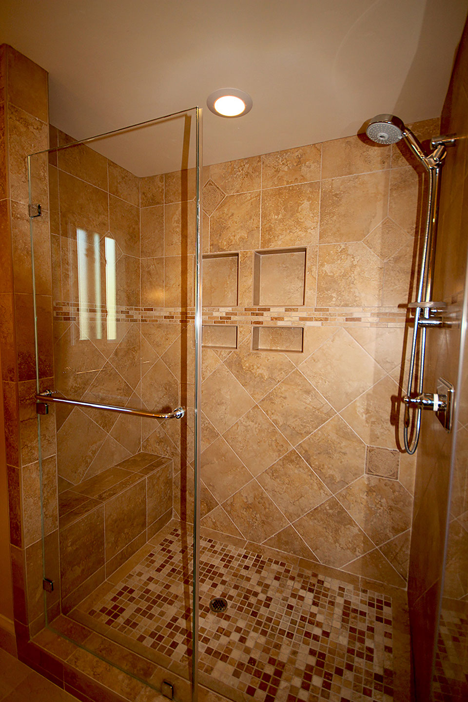 Modern stone tile shower stall, design and installation.