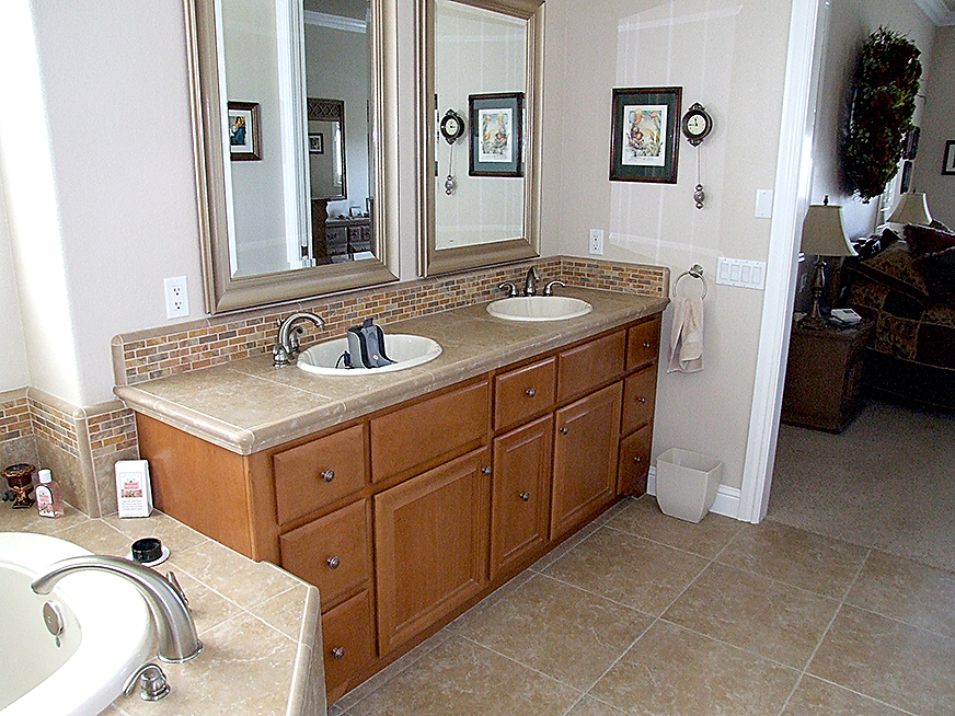 Custom installation of stone tile countertop, backsplash, flooring and jaccuzi.