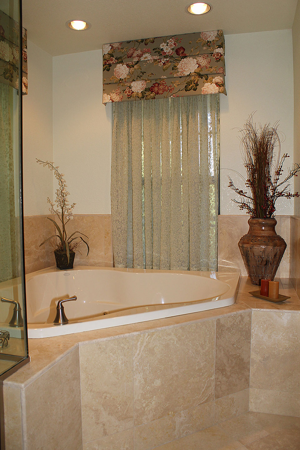 Beautiful tan marble tiling installation on bathroom jaccuzi.