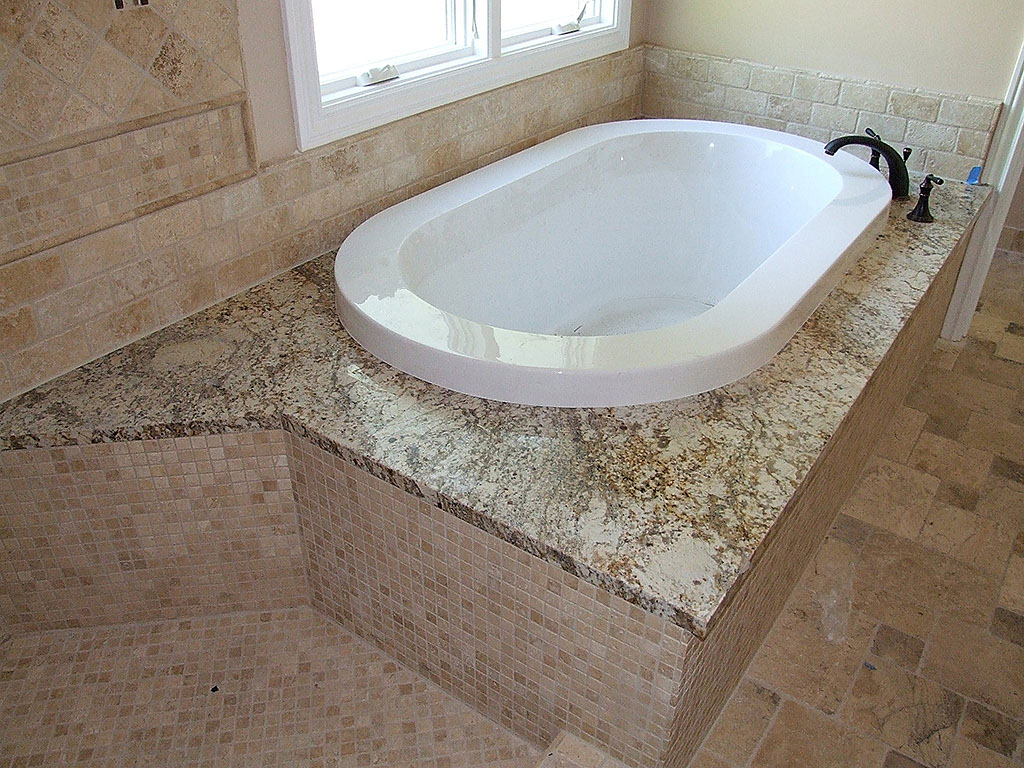 Bathroom stone surfaces and stone tiling.