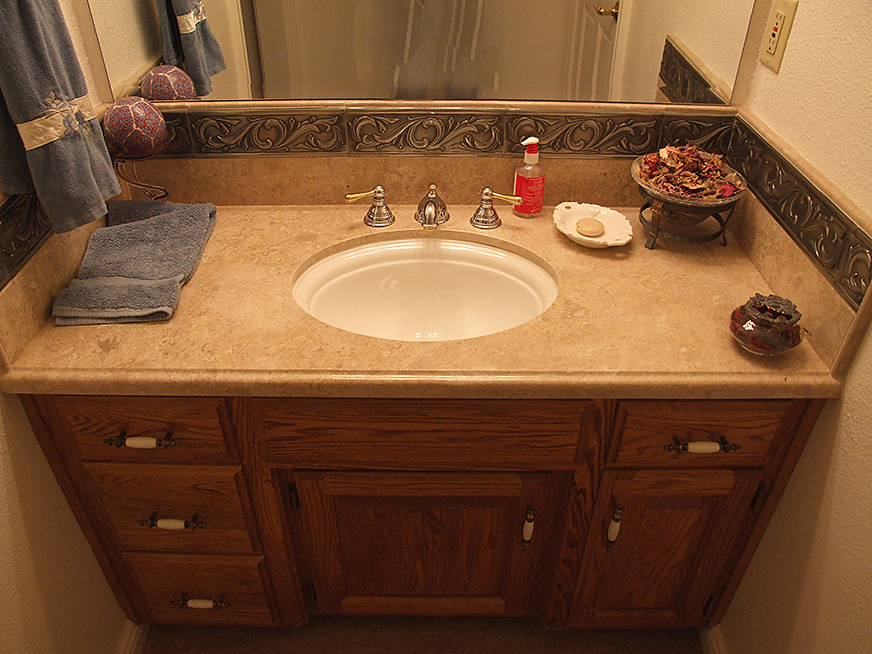 Stone countertop and backsplash installation.