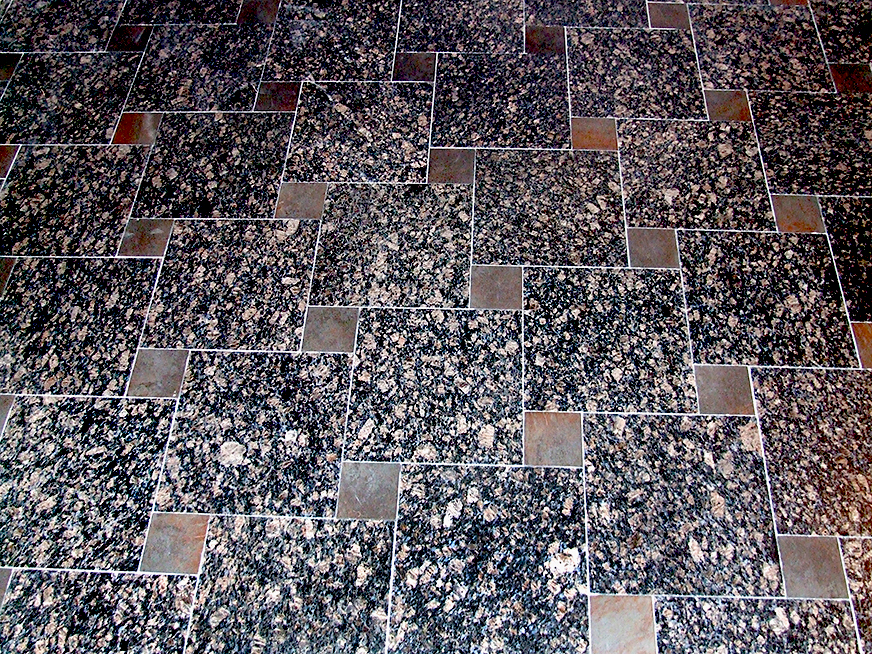 Beautiful and intricate patterned granite floor tile work.