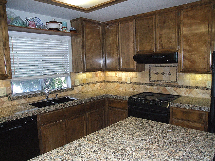 Granite tile countertops and backsplash installation.