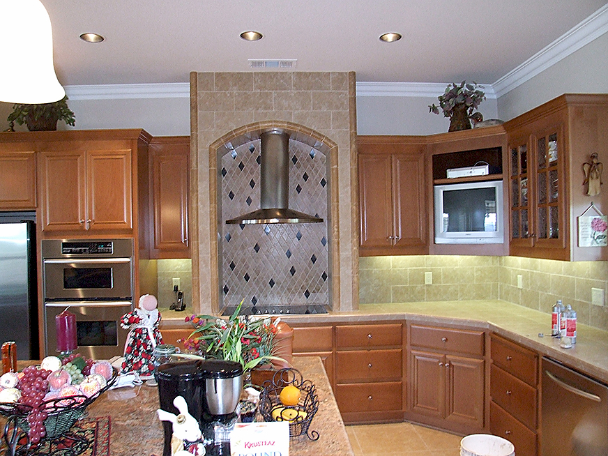 Various granite countertop and tile installations in kitchen, California.