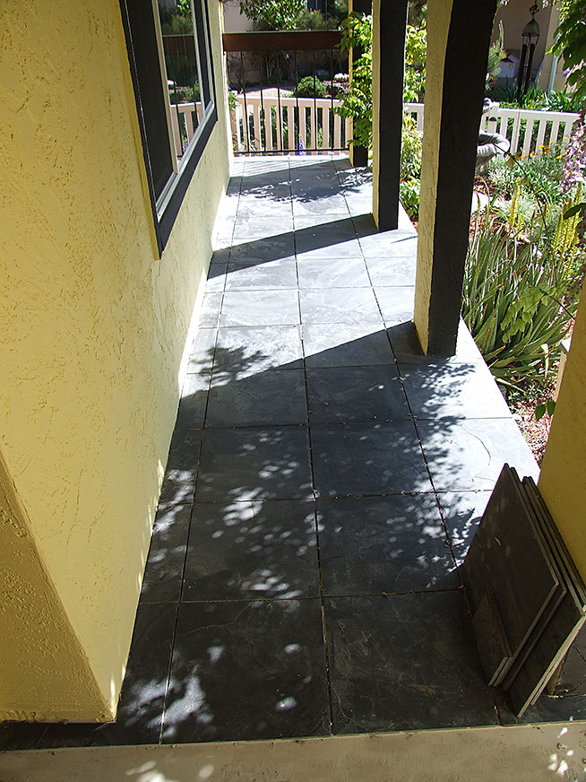 Black granite floor tiles for front porch, California installations.